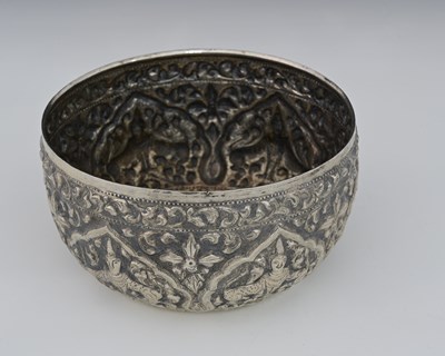 Lot 28 - An Eastern silver-coloured metal bowl,...