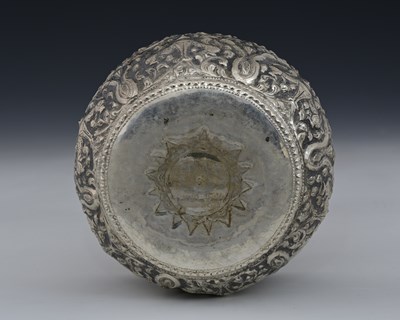 Lot 28 - An Eastern silver-coloured metal bowl,...