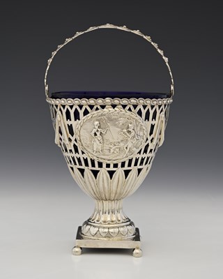 Lot 239 - A George III silver neoclassical swing handle...