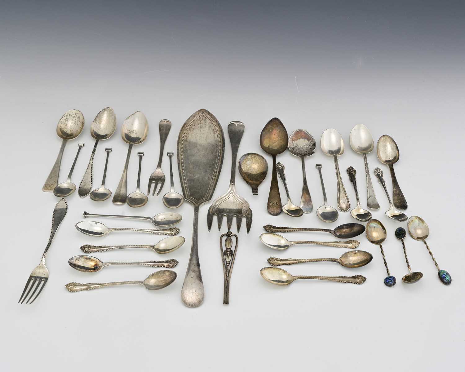 Lot 93 - A group of silver flatware, various dates and...