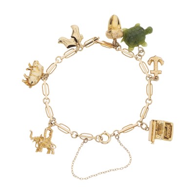 Lot 64 - A mid 20th century 9ct gold charm bracelet