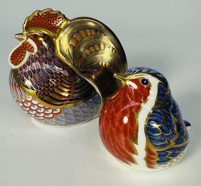Lot 149 - Two Royal Crown Derby gold button paperweights,...