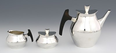 Lot 65 - A Modernist German silver three piece tea set,...