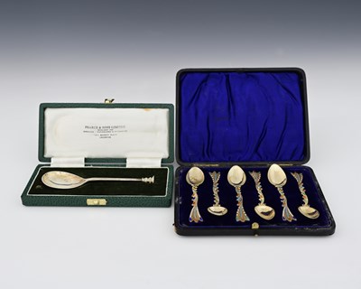 Lot 215 - A cased set of six Victorian silver-gilt and...