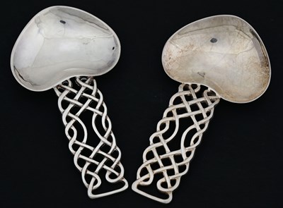 Lot 185 - A matched pair of Elizabeth II silver caddy...