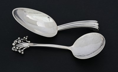 Lot 186 - Two Elizabeth II silver caddy spoons, one by R....