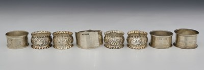 Lot 242 - A group of hallmarked silver napkin rings,...