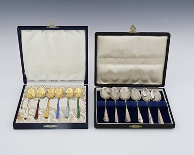 Lot 259 - A cased set of Danish silver-gilt and enamel...