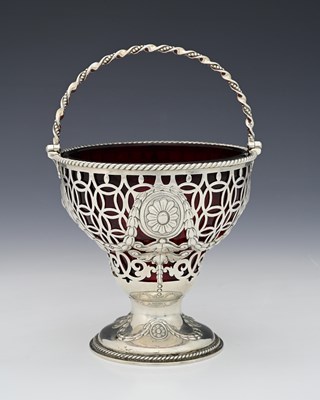 Lot 232 - A Victorian silver sugar basket, by Edward...