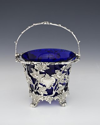 Lot 226 - A Victorian silver sugar basket, by Edward...