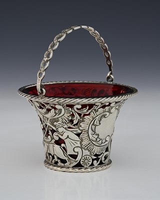 Lot 94 - A Victorian silver swing handle sugar basket...