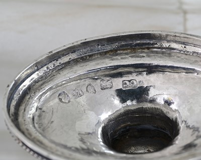 Lot 102 - A George III silver Neoclassical sugar basket,...