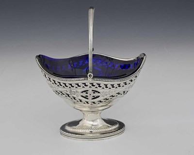 Lot 102 - A George III silver Neoclassical sugar basket,...