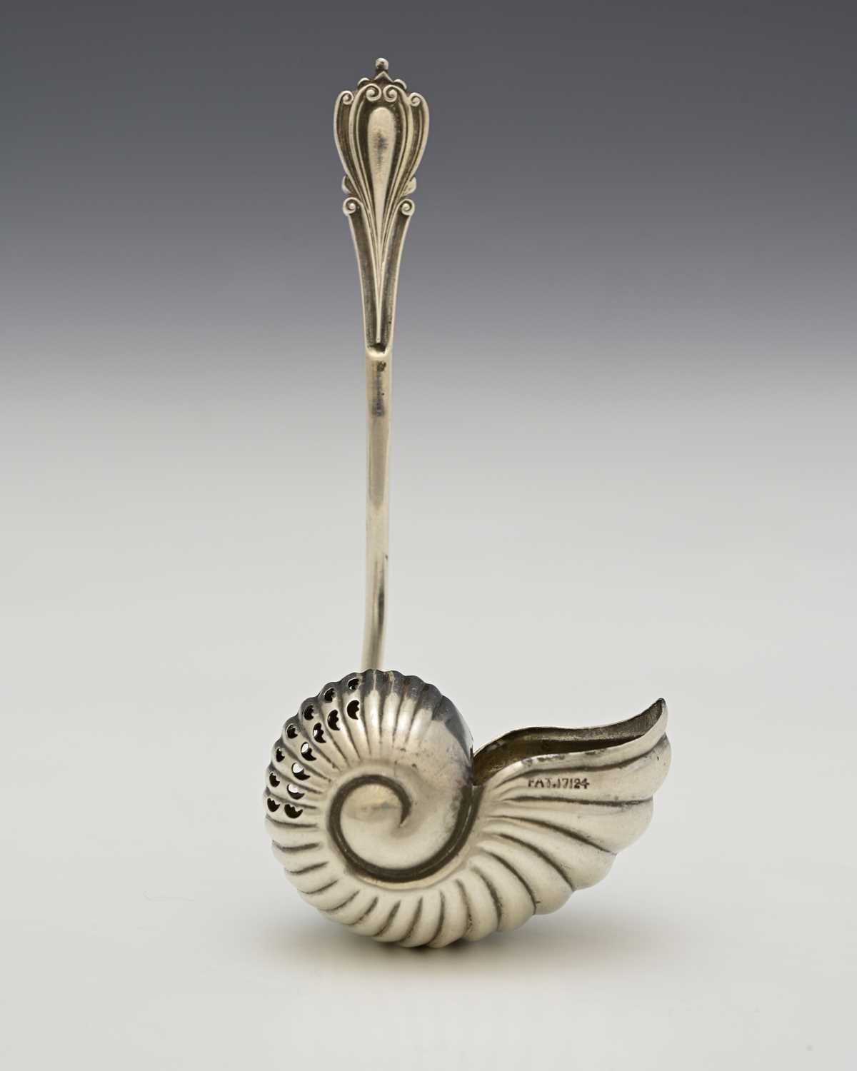 Lot 85 - A Victorian silver novelty sugar sifting spoon,...