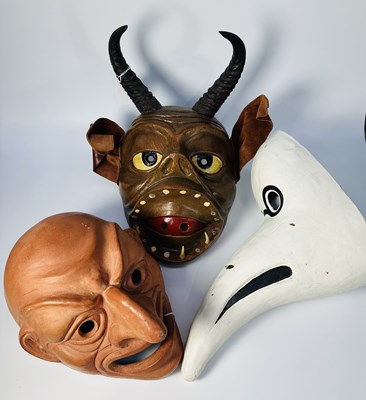 Lot 43 - A terracotta grotesque mask, possibly a makers...