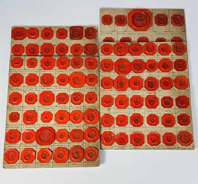 Lot 322 - Four cards mounted with reliefs of heraldic...