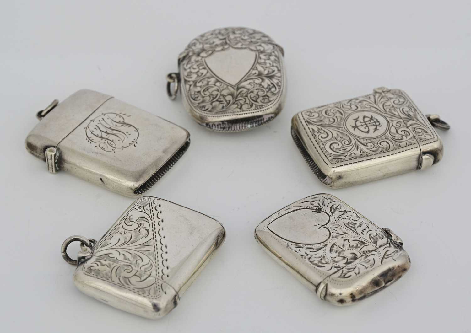 Lot 39 - Five hallmarked silver vesta cases, to include...