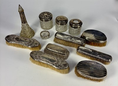 Lot 475 - A group of silver-mounted brushes, and...