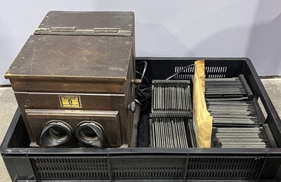 Lot 23 - A wooden cased table stereo viewer, French,...