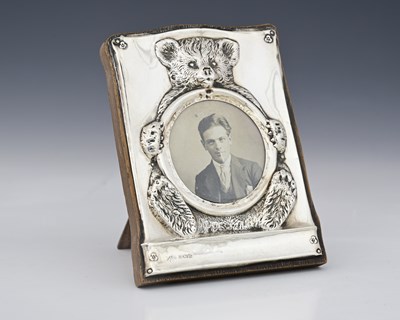 Lot 241 - An Edwardian silver novelty photograph frame,...