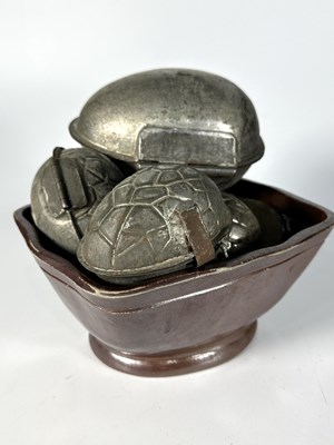 Lot 336 - A glazed brown stoneware jelly or turreen mold...