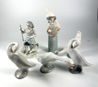 Lot 235 - A Lladro glazed porcelain figure depicting a...