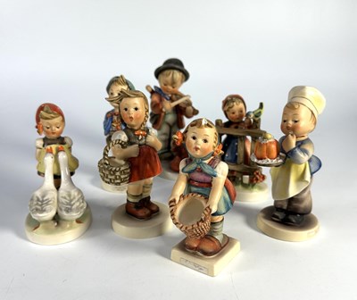 Lot 237 - Seven vintage M.I. Hummel porcelain figurines...