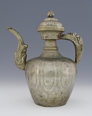 Lot 123 - A Sino Tibetan ritual ewer, silvered copper,...