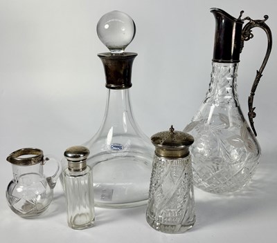 Lot 247 - Two silver mounted decanters and other, to...