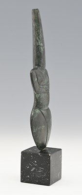 Lot 519 - A bronze Cycladic Violos female torso figurine,...