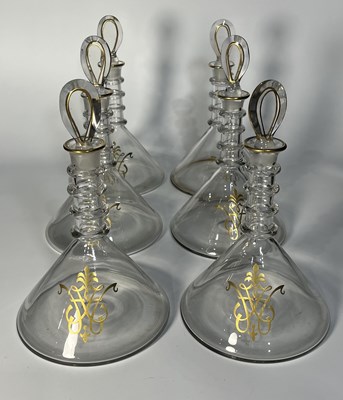 Lot 56 - Six, ship style decanters, with a loop shaped...
