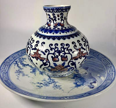 Lot 221 - A Chinese vase, raised globular body with...