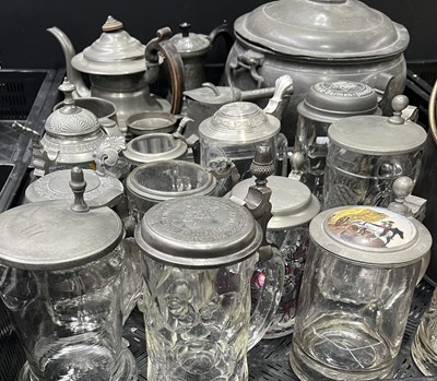 Lot 65 - A collection of domestic pewter ware and...