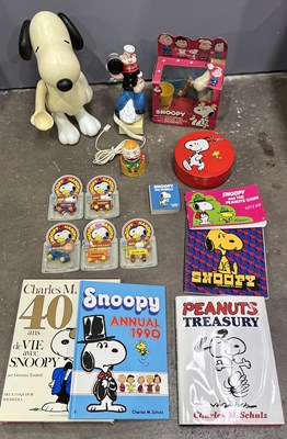 Lot 13 - A collection of Snoopy merchandise books and...