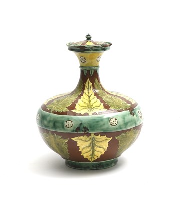 Lot 216 - A Della Robbia Pottery Dutch jar and cover by...