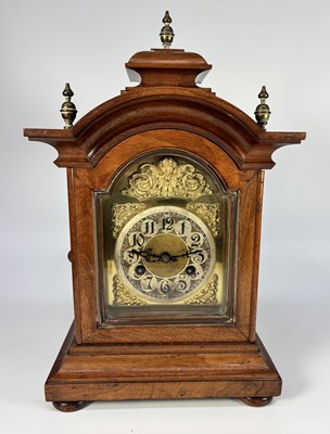 Lot 326 - A late 19th century Junghans stepped walnut...