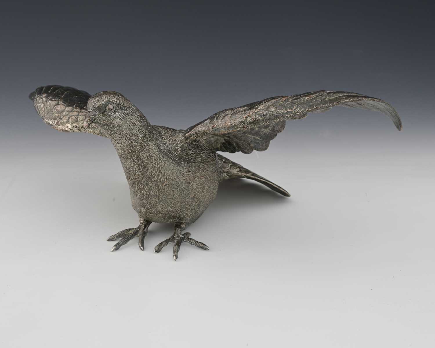 Lot 9 - A twentieth-century model of a pigeon,...