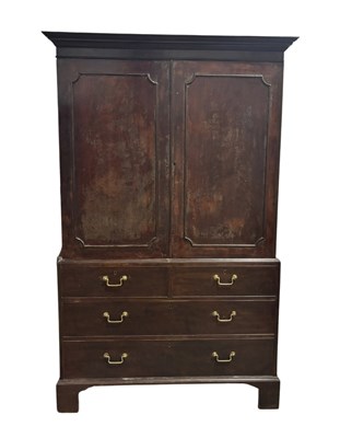 Lot 638 - A Georgian mahogany linen press, cornice above...