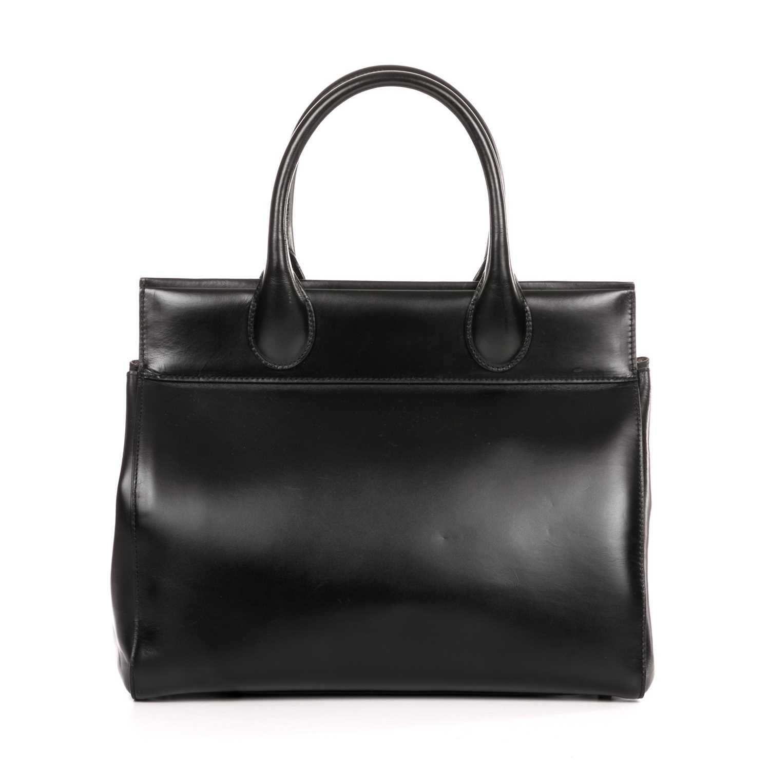 Lot 236 - Alaia, a smooth black leather handbag,...