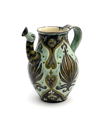 Lot 230 - A Della Robbia Pottery Dragon Jug by Liz...