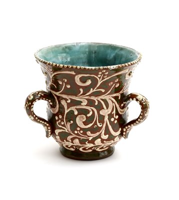 Lot 243 - A Della Robbia Pottery tyg by Charles Collis,...