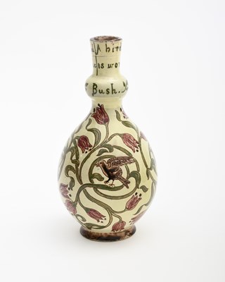 Lot 252 - A Della Robbia Pottery bottle vase by Violet...