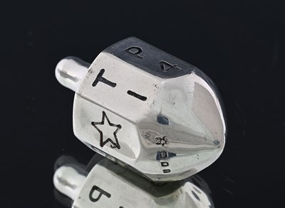 Lot 141 - A George V silver 'Put and Take' gambling or...