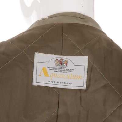 Lot 243 - Aquascutum, a men's trench coat, designed with...