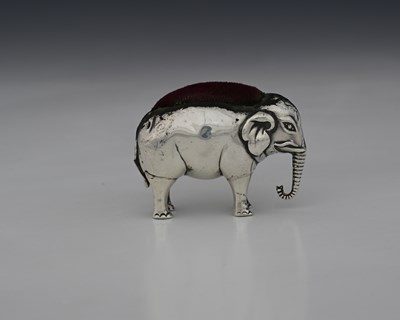 Lot 50 - An Edwardian novelty silver pin cushion,...