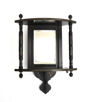Lot 428 - An Aesthetic Movement ebonised wood corner...