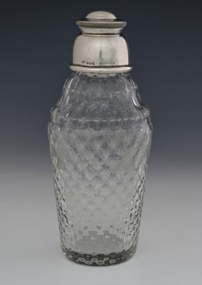 Lot 289 - Hukin & Heath, a George V silver-mounted glass...