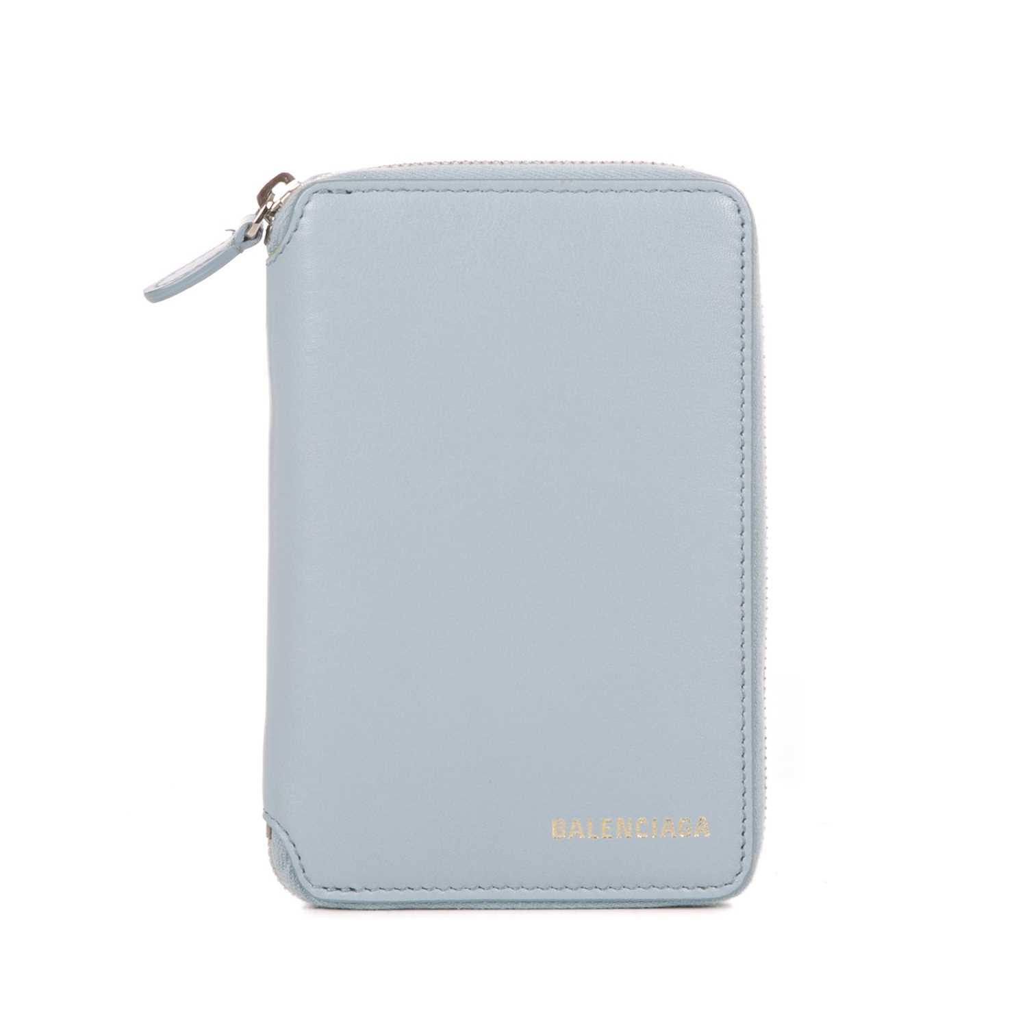 Lot 246 - Balenciaga, a pale blue leather compact zippy...