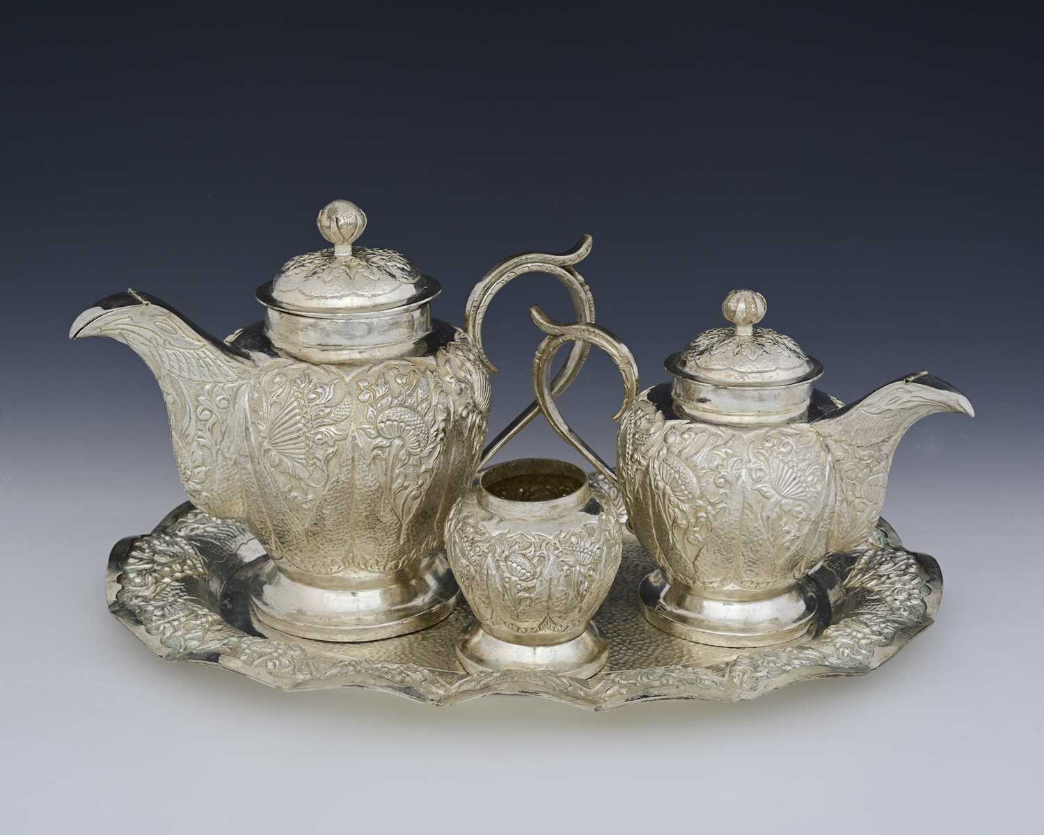 Lot 5 - A white metal tea service with tray, possibly...