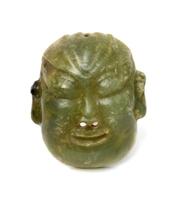 Lot 521 - A pre-Colombian style jade mask, probably 20th...